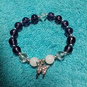 Silvertone crystal butterfly white purple beaded stretch bracelet